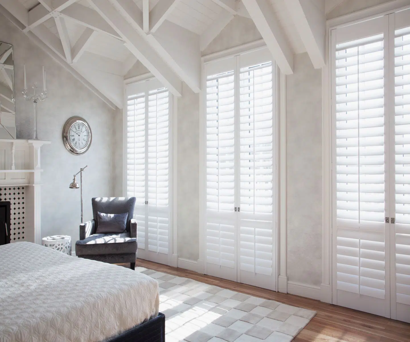 A bright and beautiful bedroom in Bethesda, MD, with with Woodlore Shutters