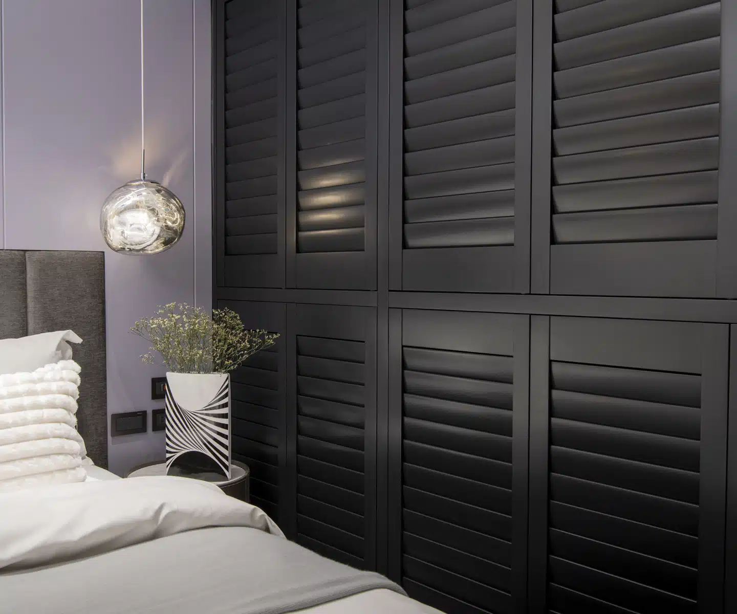 Dark, Elegant Brightwood Shutters in a bedroom near Fairfax, Va