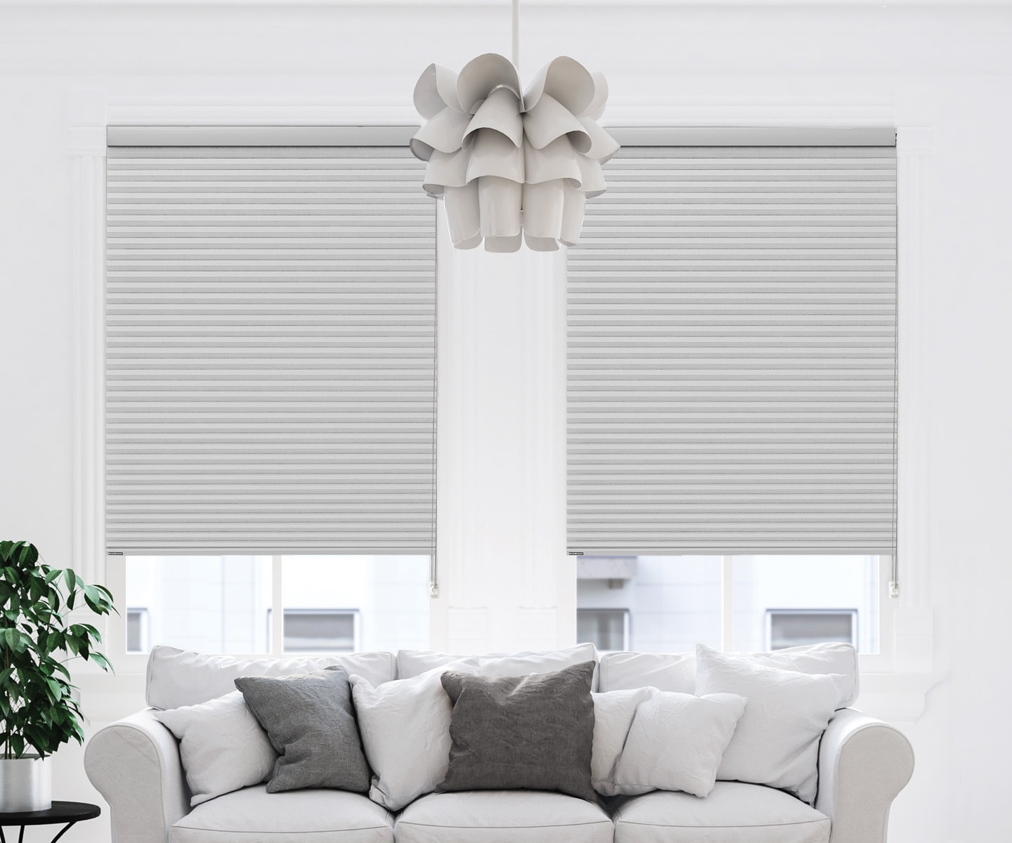 Bright, white living room with Portrait Honeycomb shades near Fairfax, Va