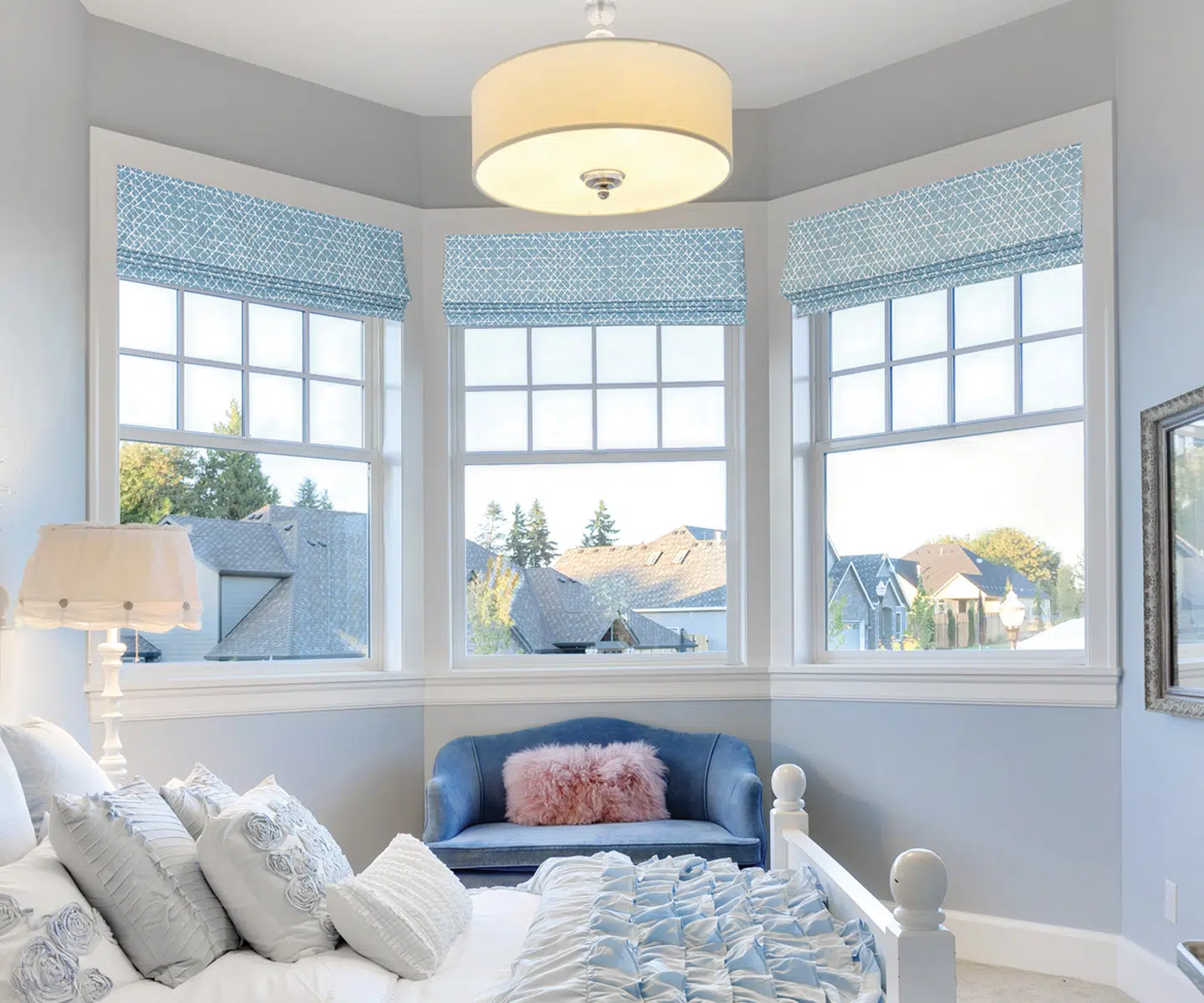Adorable girls bedroom with blue Centerpiece Roman Shades located in McLean, VA